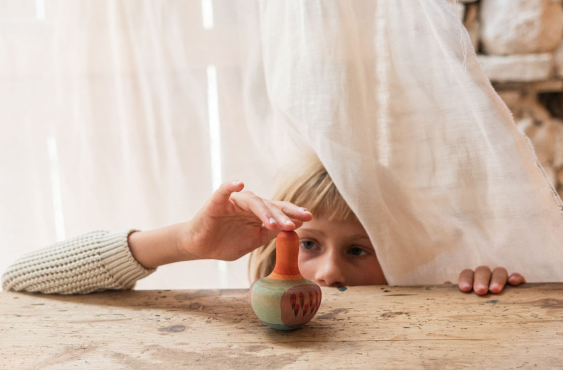 Mellow orange bird Grapat - trottola