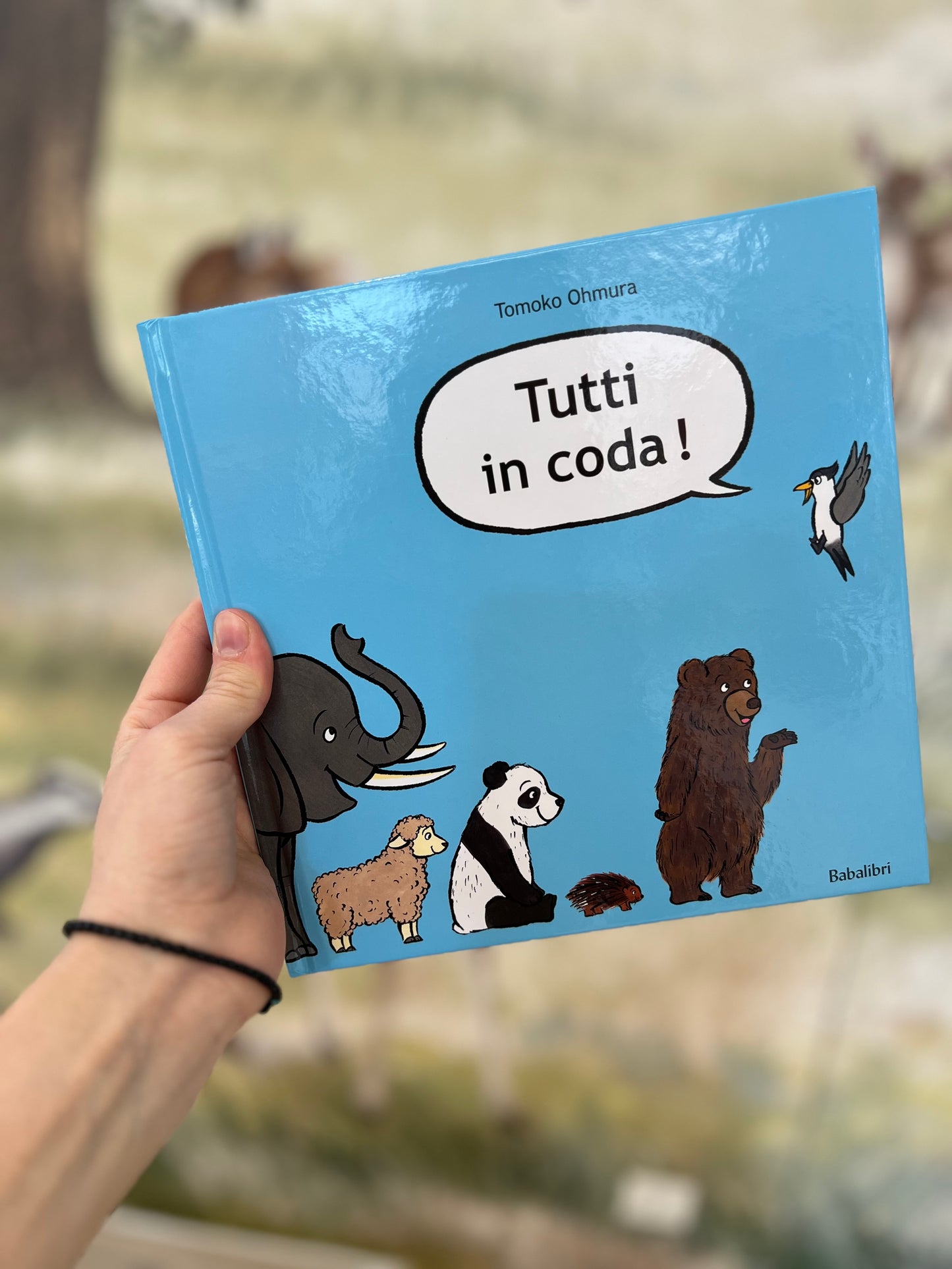 Tutti in coda, Tomoko Ohmura