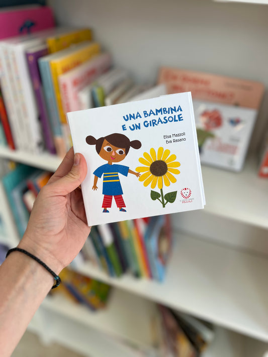 Una bambina e un girasole, Elisa Mazzoli, Eva Rasano