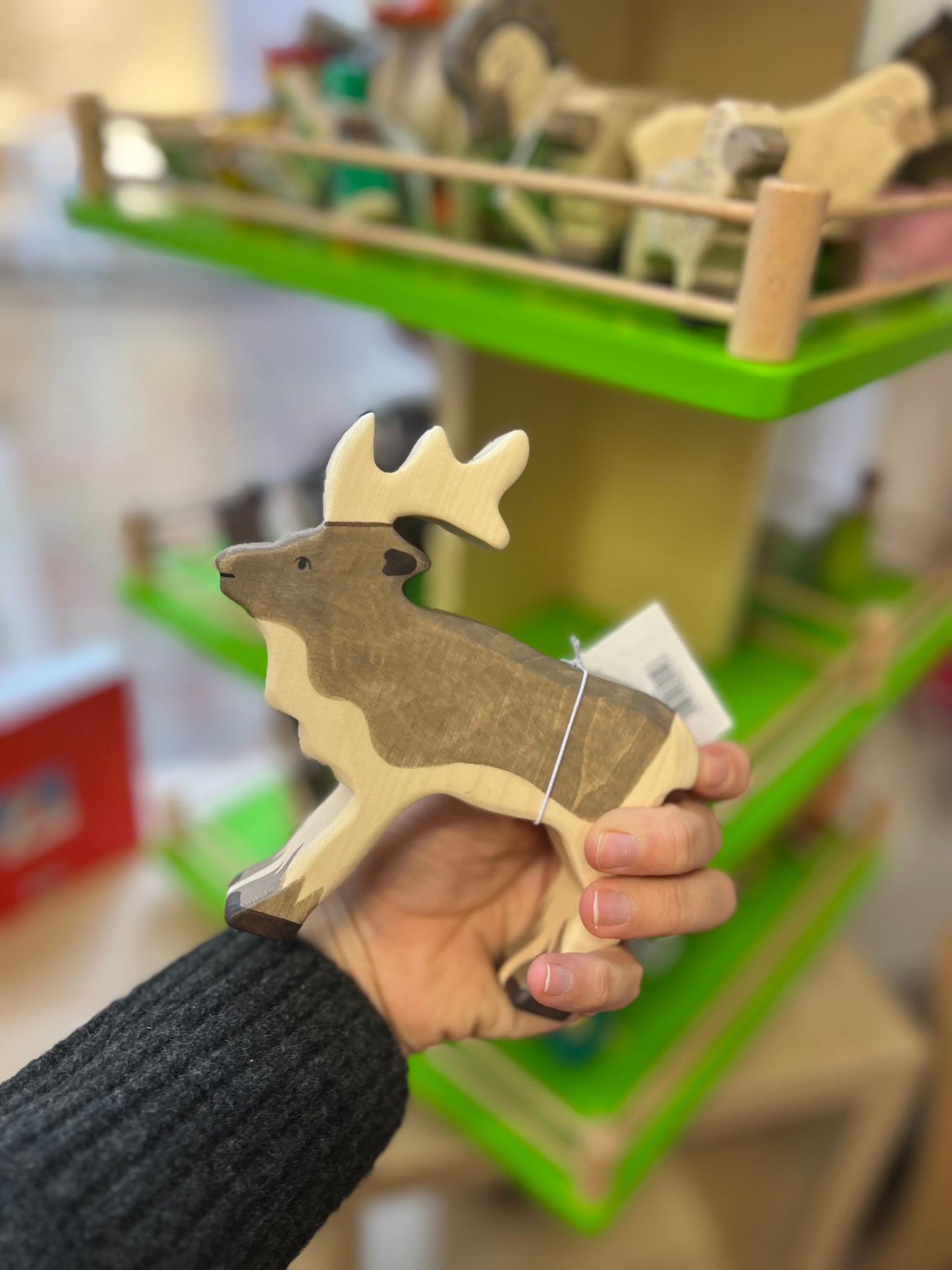 Renna in legno, Holztiger